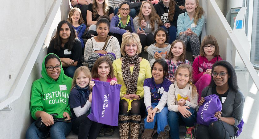 picture of President Ann Buller with a group of young girls visiting from Toronto middle schools